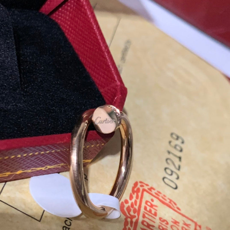 Side view of Cartier unisex jewelry piece