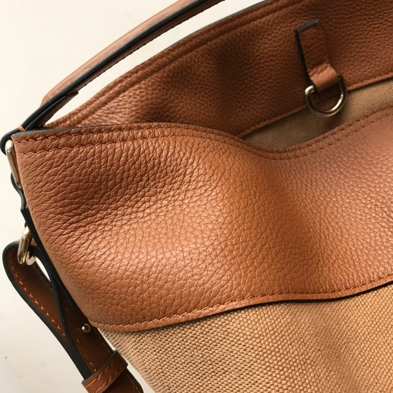 Ziva's Charm handbag – side angle view (one versatile size)