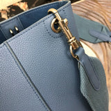 Side profile of classic statement women's handbag – women's everyday handbag
