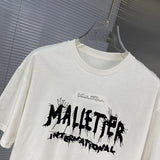 Close-up detail shot of Louis Vuitton cotton t-shirt with streetwear-inspired cut