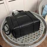 Back view of polished chic women's handbag – women's designer-style accessory