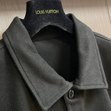 Front view of Louis Vuitton luxury clothing with signature branding