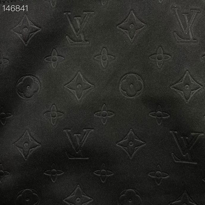 Side profile of Louis Vuitton luxury clothing with tailored silhouette