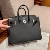  structured satchel detail view showing craftsmanship 8