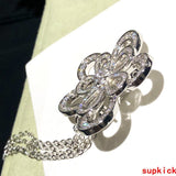 Full view of Van Cleef & Arpels unisex jewelry piece