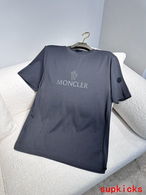 Back view of Moncler luxury clothing with signature branding