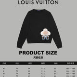 Close-up detail shot of Louis Vuitton luxury clothing with signature branding