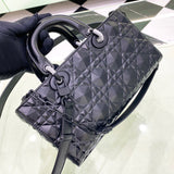 Styled lifestyle shot of elevated modern women's handbag – women's luxury accessory