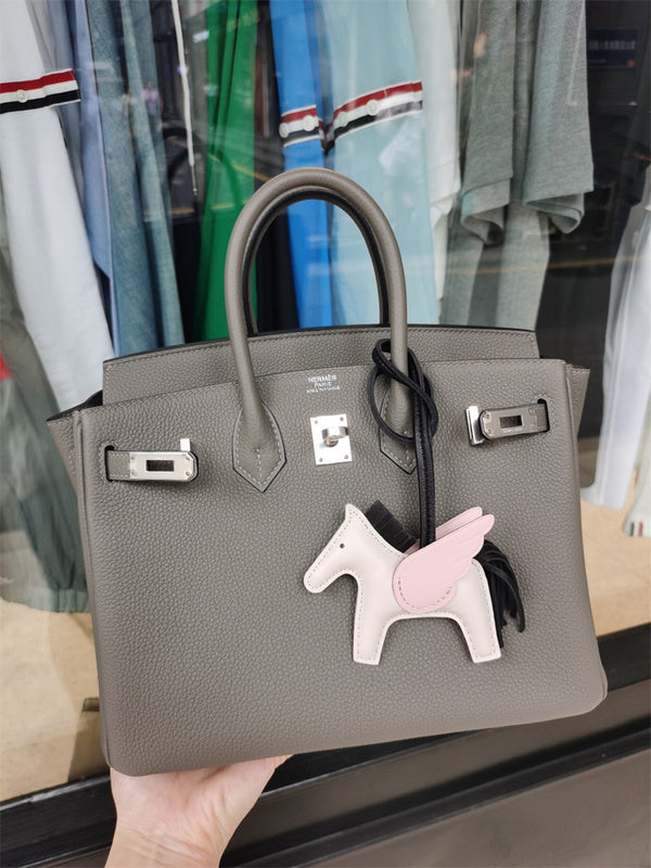  Signature shoulder bag carried on shoulder 10