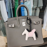  Signature shoulder bag carried on shoulder 10
