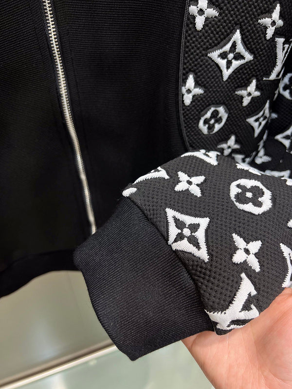 Back view of Louis Vuitton luxury clothing with label-forward styling
