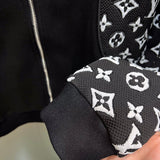 Back view of Louis Vuitton luxury clothing with label-forward styling