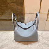 Side view of sleek structured handbag