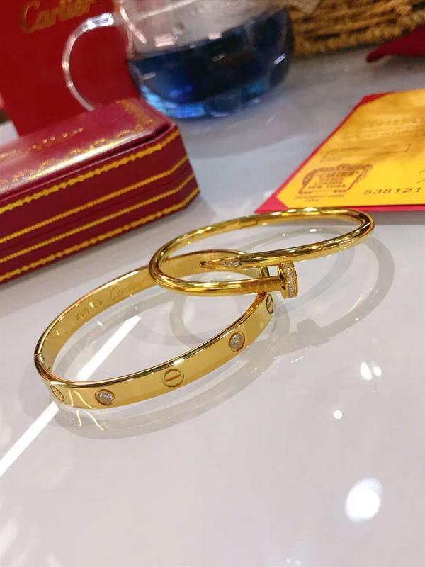 Front view of Cartier unisex jewelry piece