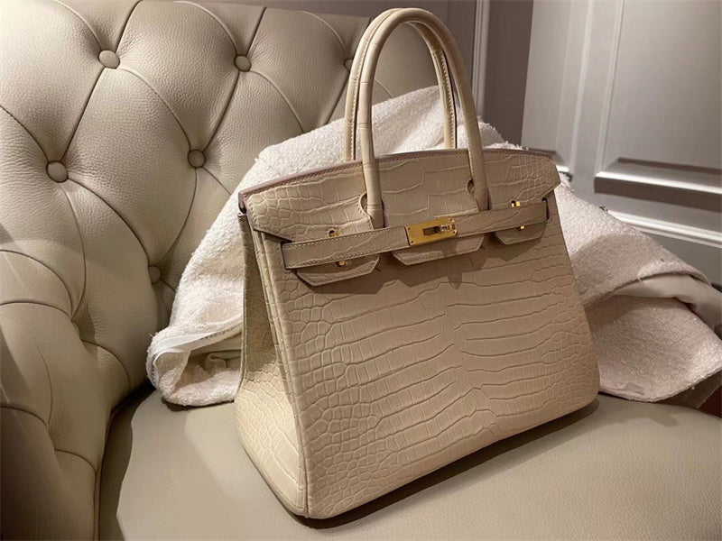 Side view of curated structured handbag
