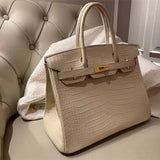 Side view of curated structured handbag