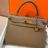  clean-lined shoulder bag detail view showing craftsmanship