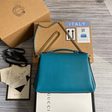 Front view of signature polished women's handbag – women's everyday handbag