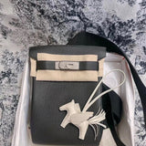Poised bag shown from front angle