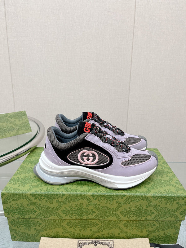 Gucci Designer sneakers in bold contrast sleek tonal finish front view
