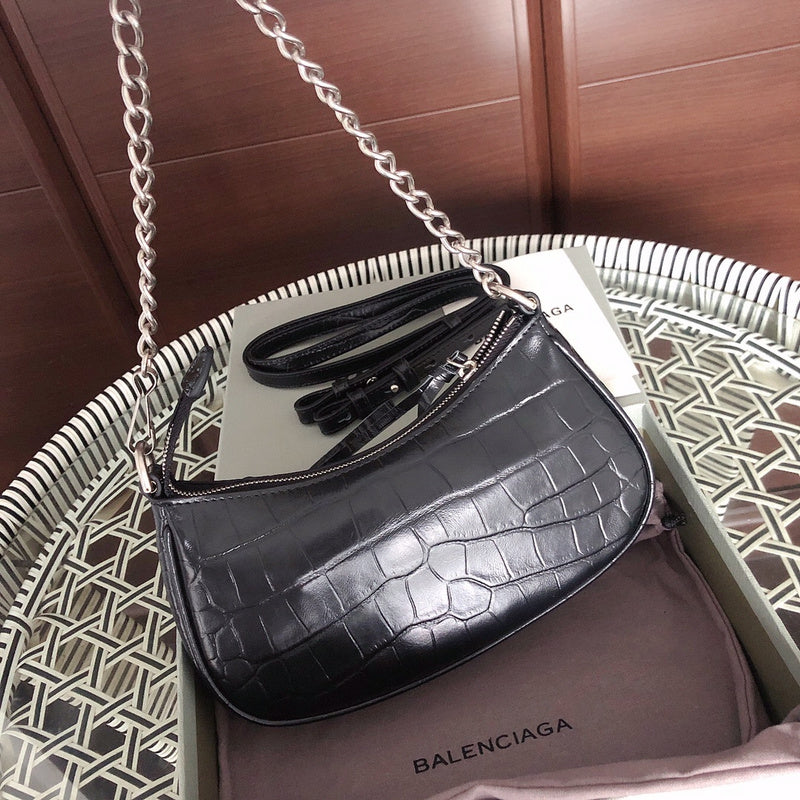 Styled lifestyle shot of everyday-luxe polished women's handbag – women's luxury accessory