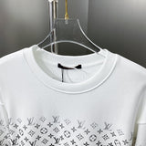 Close-up detail shot of Louis Vuitton luxury clothing with everyday silhouette