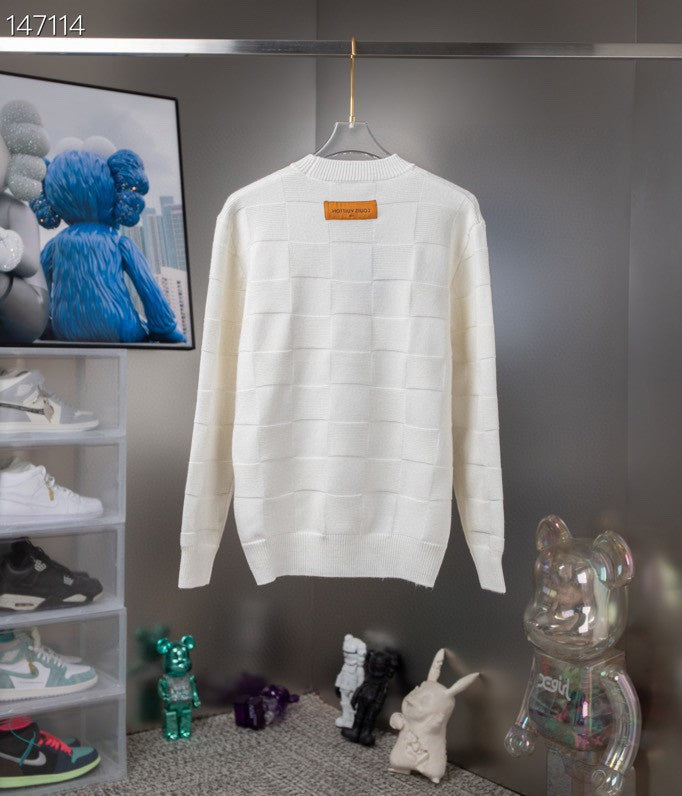 Side profile of Louis Vuitton luxury clothing with tailored silhouette