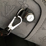 Styled lifestyle shot of everyday-luxe polished women's handbag – women's luxury handbag