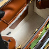 Handle and strap detail of statement classic women's handbag – women's luxury handbag