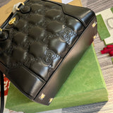 Side profile of signature polished women's handbag – women's luxury handbag