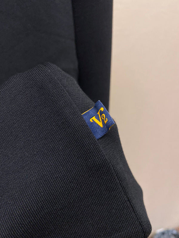 Front view of Louis Vuitton luxury clothing with runway-inspired design