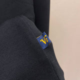 Front view of Louis Vuitton luxury clothing with runway-inspired design