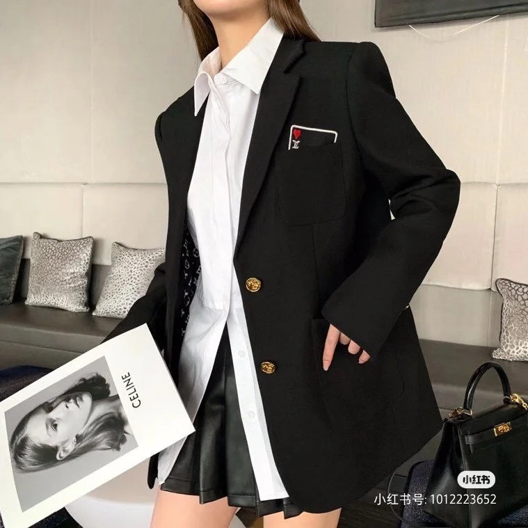 Side profile of Louis Vuitton luxury clothing with logo-detail design