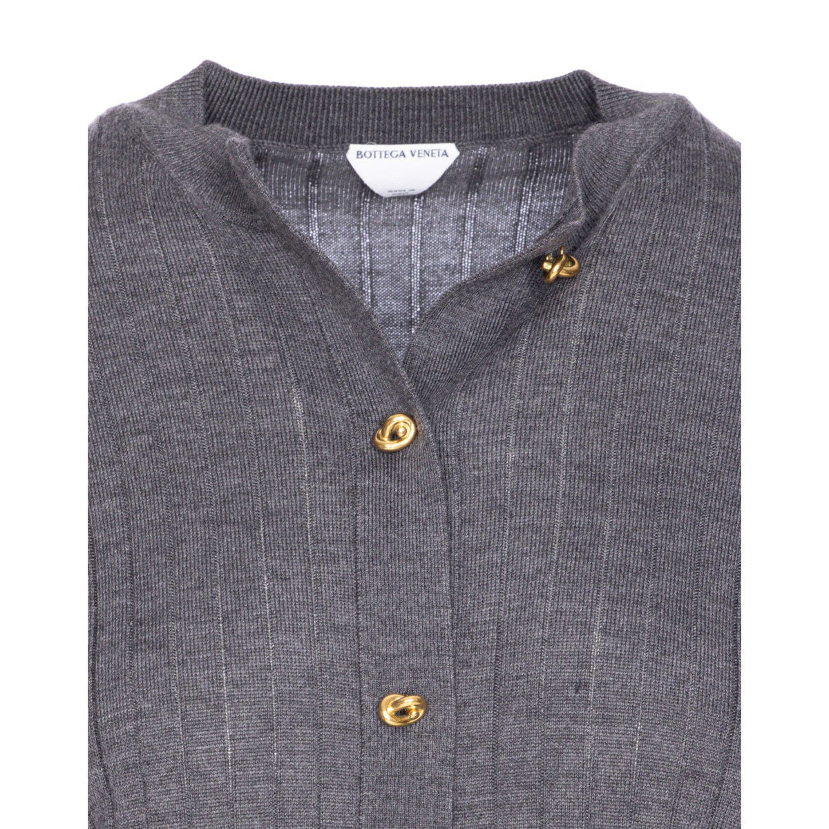 Close-up of Bottega Veneta cardigans hardware and fine stitching