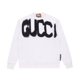 Front view of Gucci luxury clothing with tailored silhouette