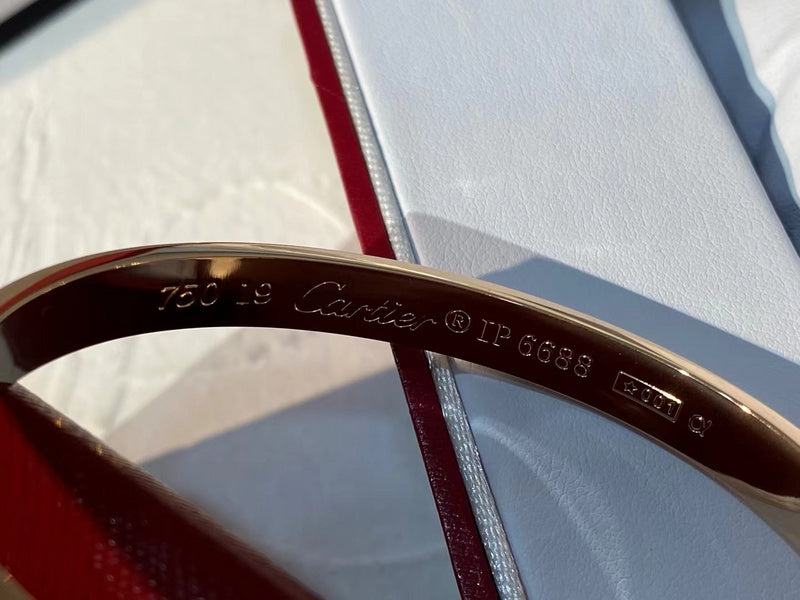Angled view of Cartier unisex jewelry piece