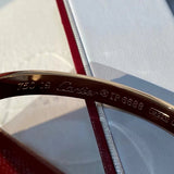 Angled view of Cartier unisex jewelry piece