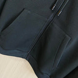 Flat lay presentation of Louis Vuitton luxury clothing with everyday silhouette