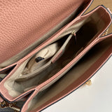 Side profile of statement sleek women's handbag – women's statement bag