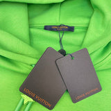 Flat lay presentation of Louis Vuitton luxury clothing with tailored silhouette