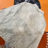 Back view of Gucci luxury clothing with logo-detail design