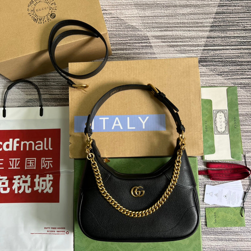 Side profile of polished elevated women's handbag – women's luxury accessory