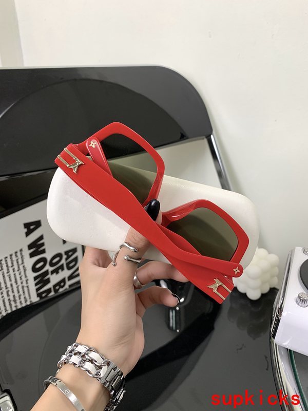 Lifestyle view of Louis Vuitton unisex sunglasses