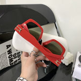 Lifestyle view of Louis Vuitton unisex sunglasses