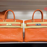 Side view of poised structured handbag