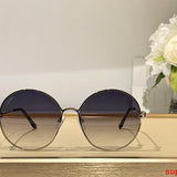 Close-up detail view of Cartier unisex sunglasses