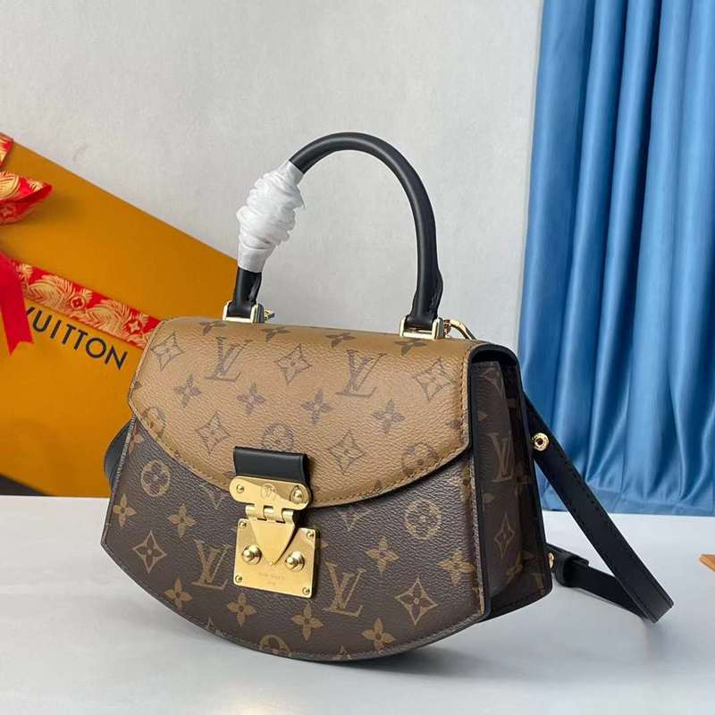 Close-up detail of signature polished women's handbag – women's premium purse