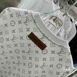 Side profile of Louis Vuitton luxury clothing with tailored silhouette