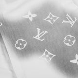 Flat lay presentation of Louis Vuitton luxury clothing with monogram-inspired silhouette