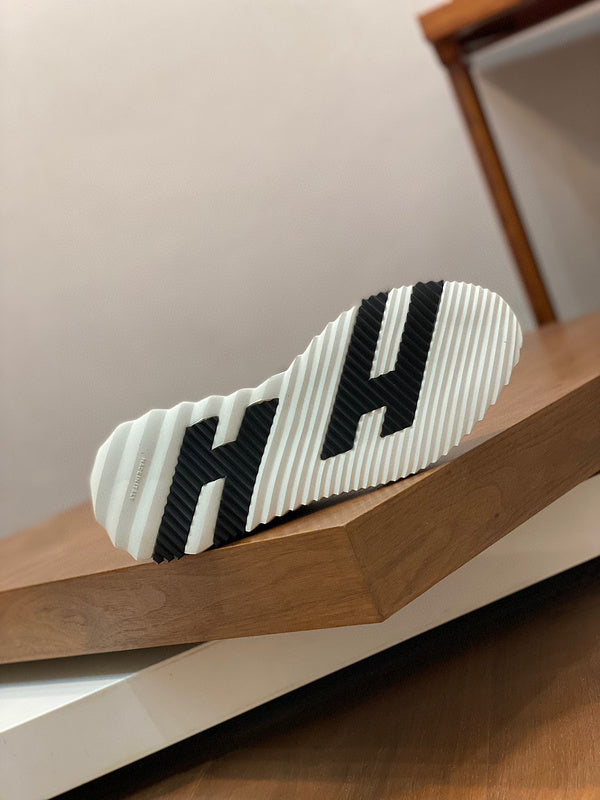 Hermes sandals Style 104 - logo and branding close-up